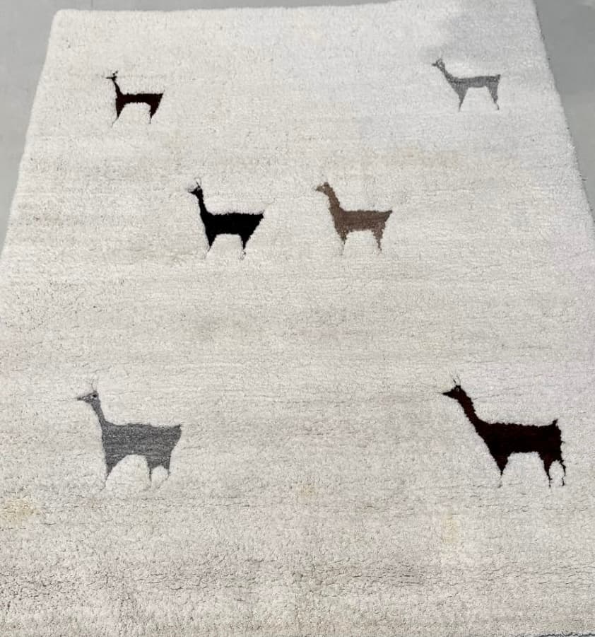 Cat-motif carpet after cleaning — colours restored